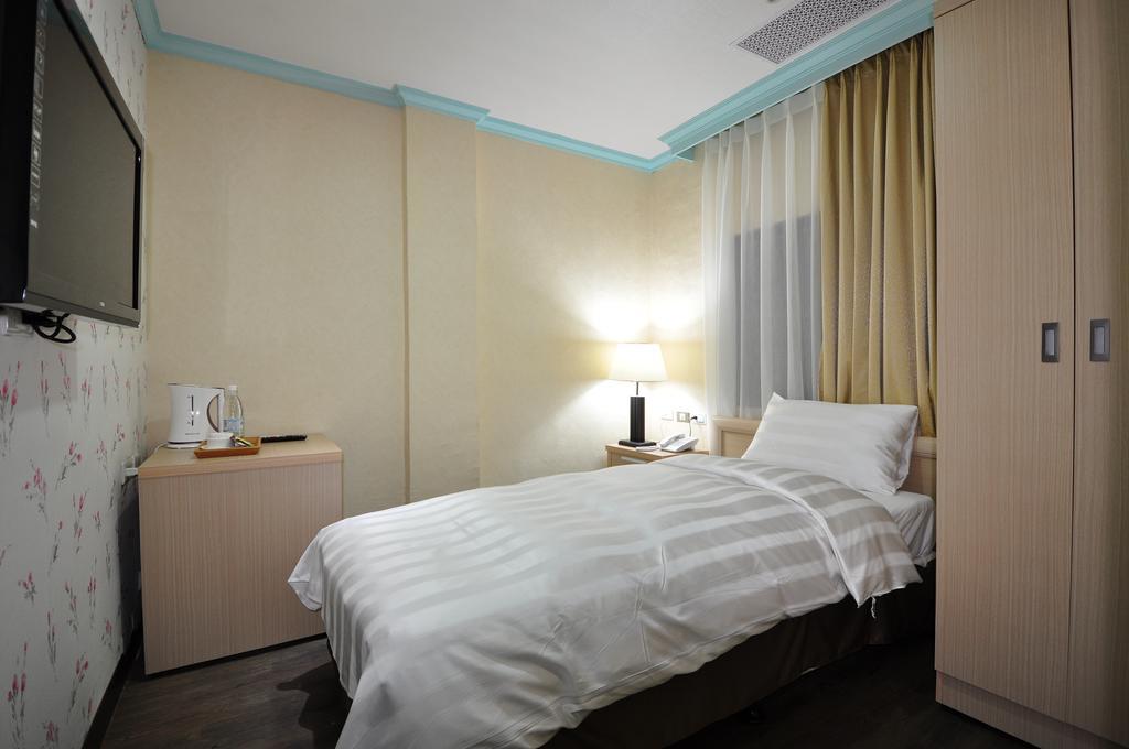 A Casa Hotel Таоуан Стая снимка