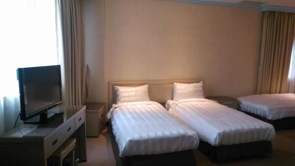 A Casa Hotel Таоуан Стая снимка