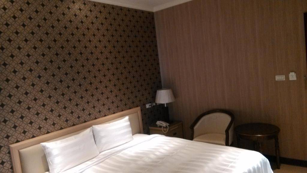 A Casa Hotel Таоуан Стая снимка