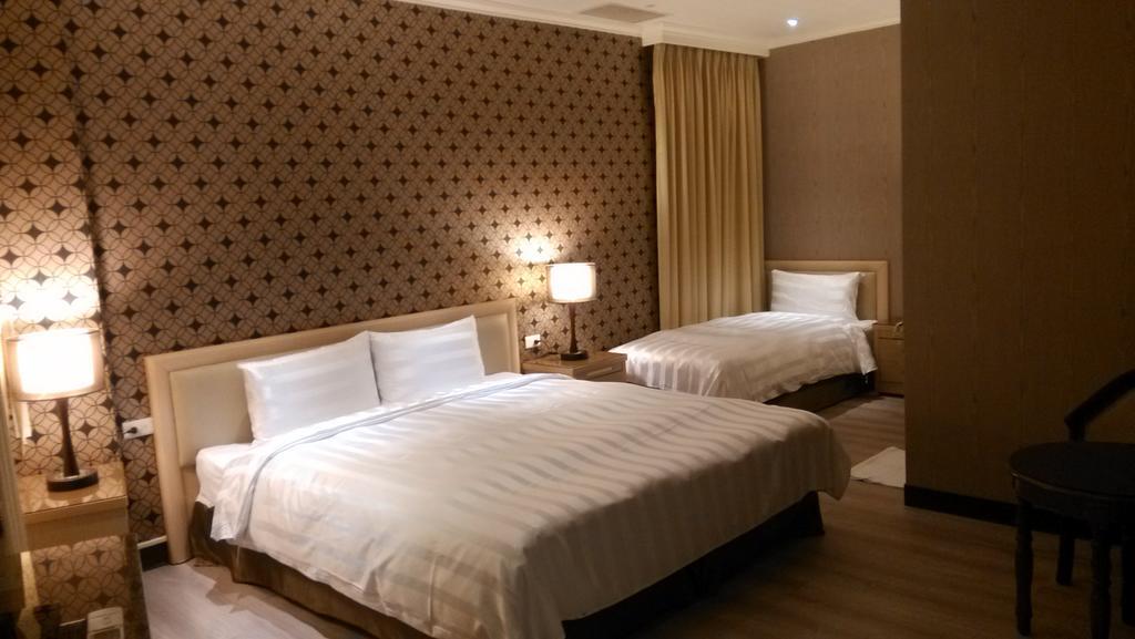 A Casa Hotel Таоуан Стая снимка
